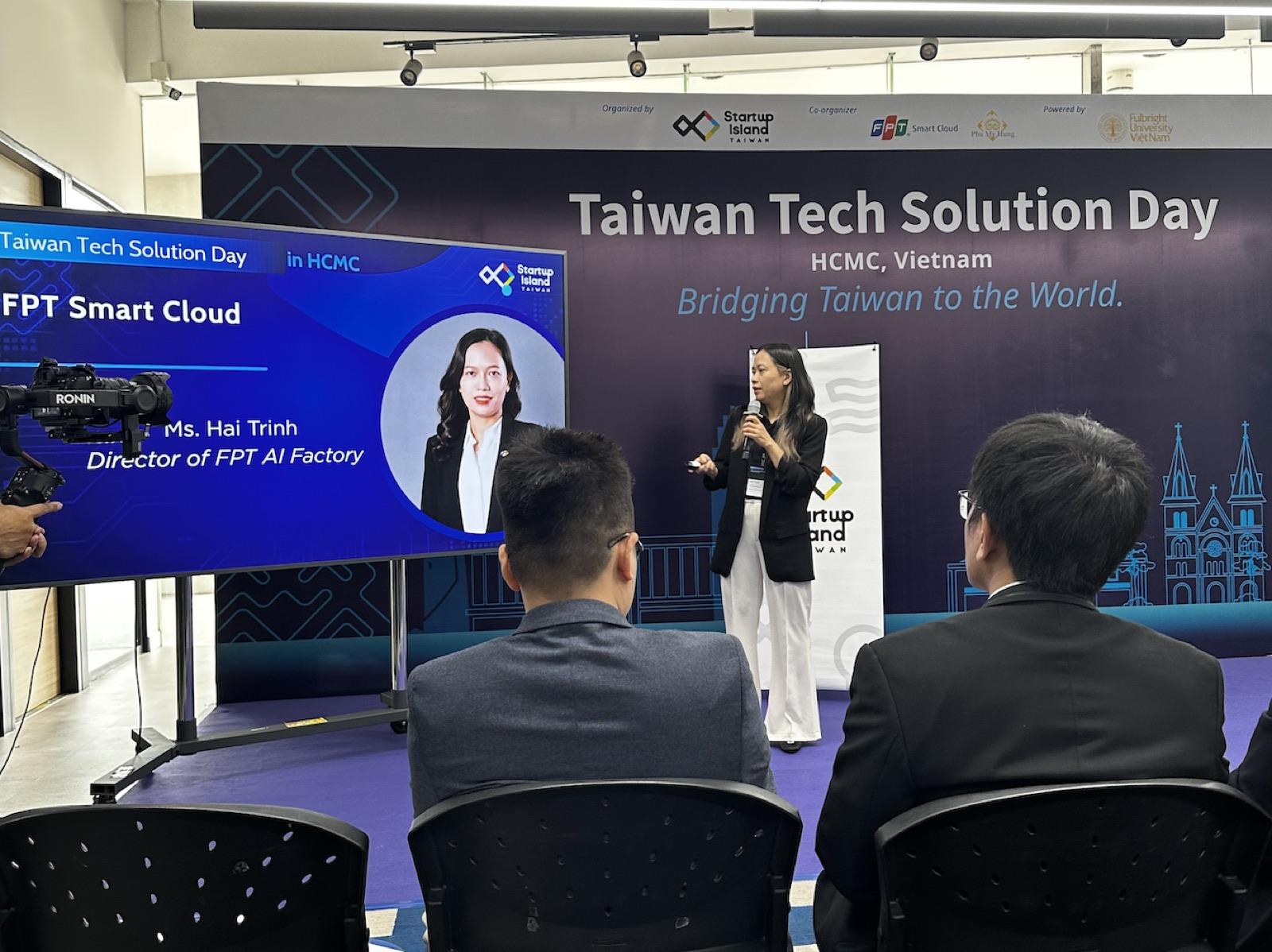 FPT AI Factory 總監 Ms. Hai Trinh 在 Taiwan Tech Solution Day 台上演講,投影幕顯示 FPT Smart Cloud 講者資訊